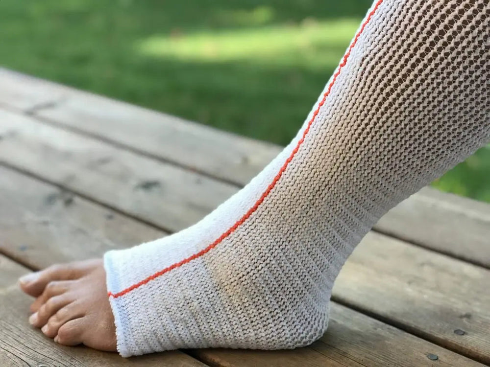 Edemawear Lite Stockinet Medium For Tender Skin For Limb Circumference Up To 90 Cm (36"), Orange Stripe, Single Stockinet - 1 Each